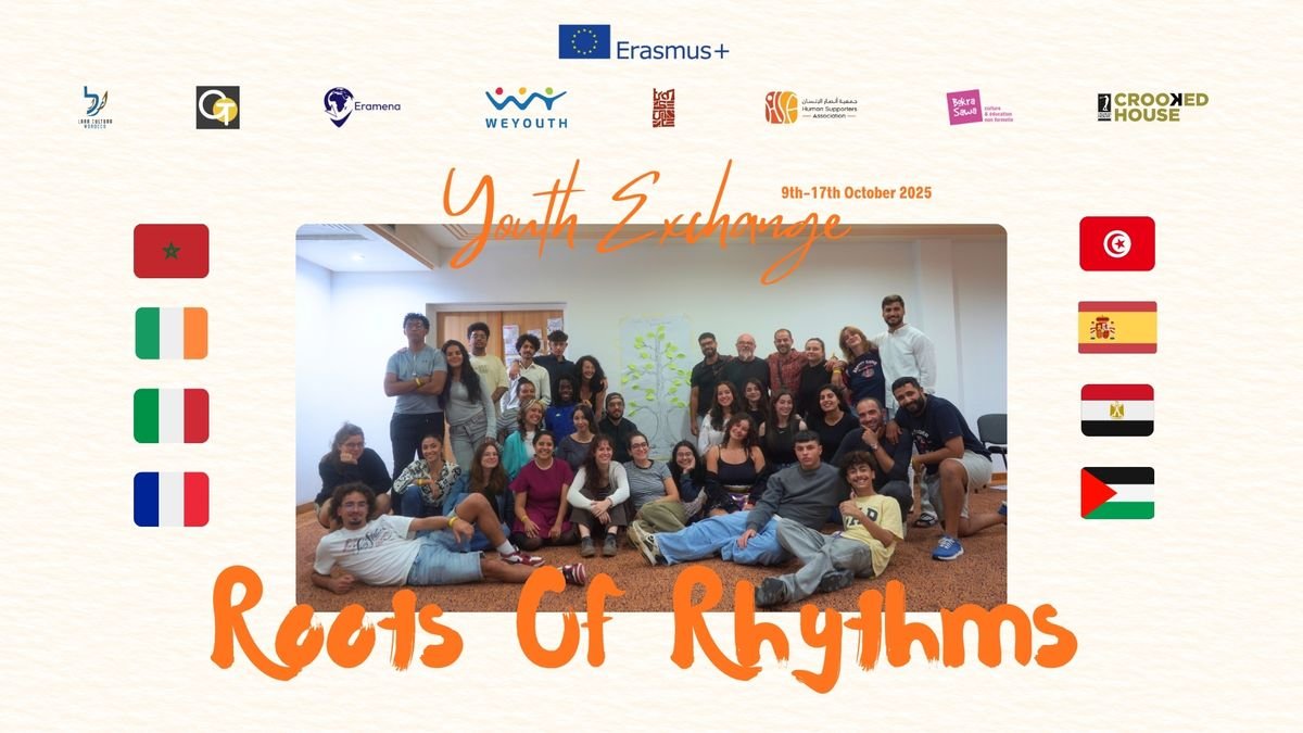 Group photo from the Roots of Rhythms youth exchange with partner-country flags